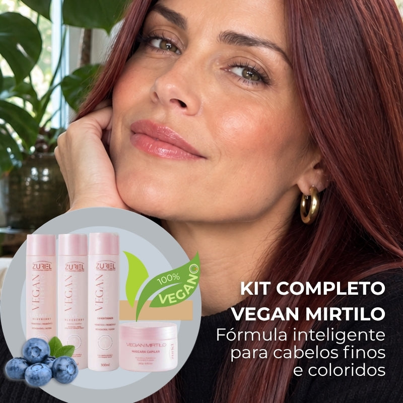 Mulher com cabelo pintado e kit completo com frascos de shampoo, condicionador, leave-in e pote de máscara capilar 100% veganos Vegan MIrtilo Zuriel Orgulho Gray Fórmula inteligente para cabelos finos e coloridos.